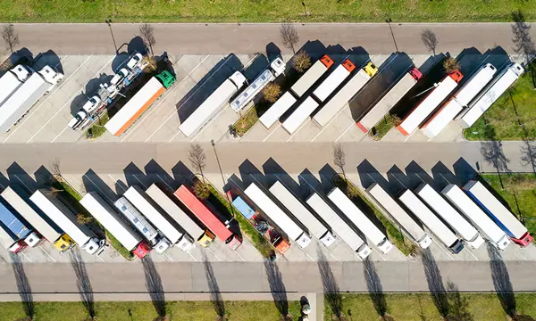 aerial-view-semi-trucks-trailers-parking-lot