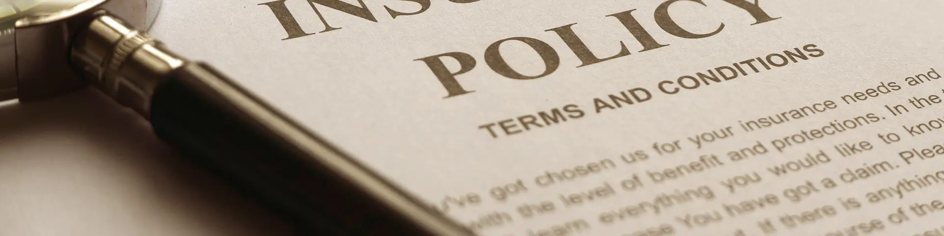 insurance-policy-document-magnifying-glass