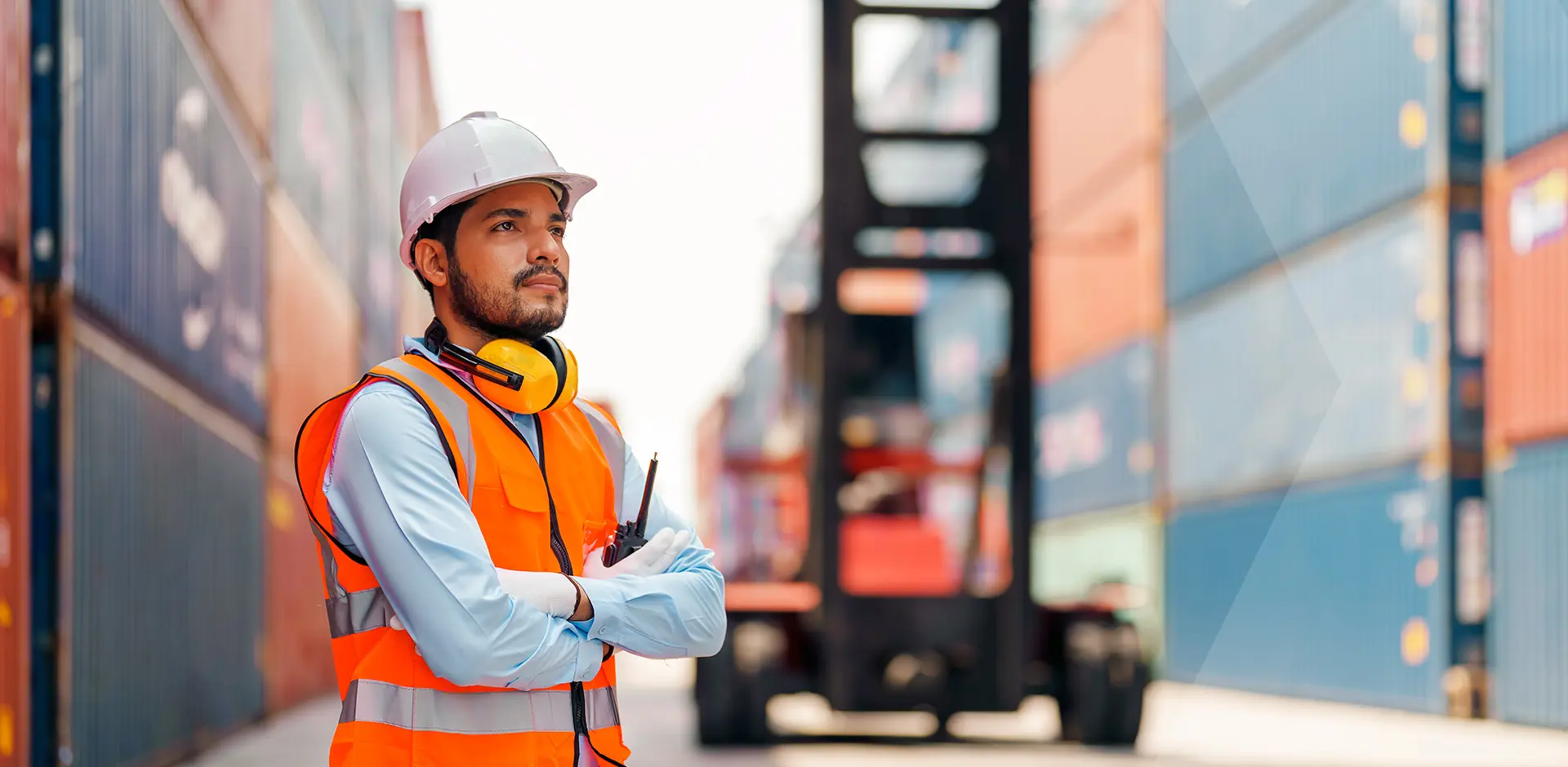 logistics-worker-shipping-yard-containers