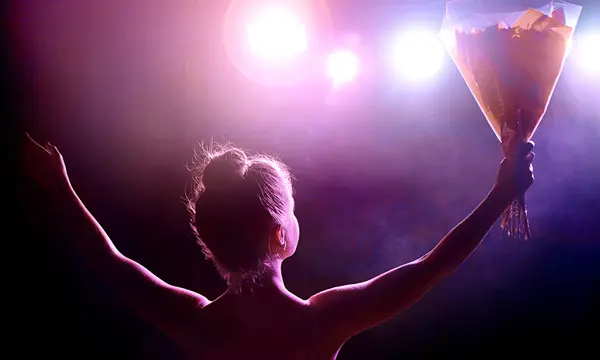 performer-stage-bouquet-event-logistics